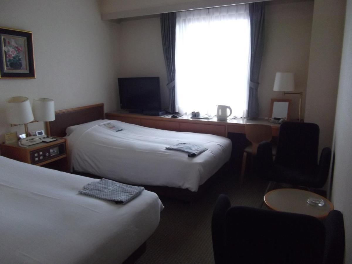 Ichikawa Grand Hotel Bagian luar foto